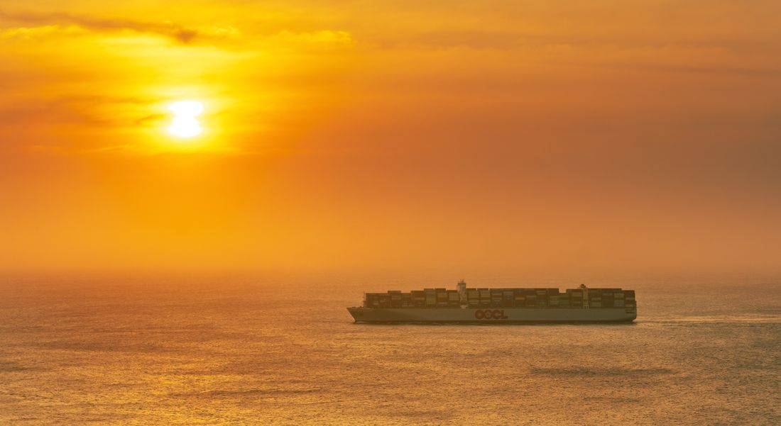 Container ship at sunset